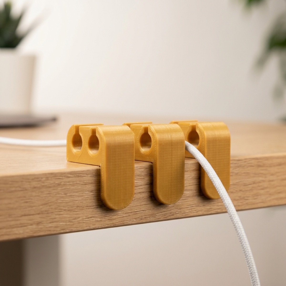 3D-printed cable holder and headphone hook