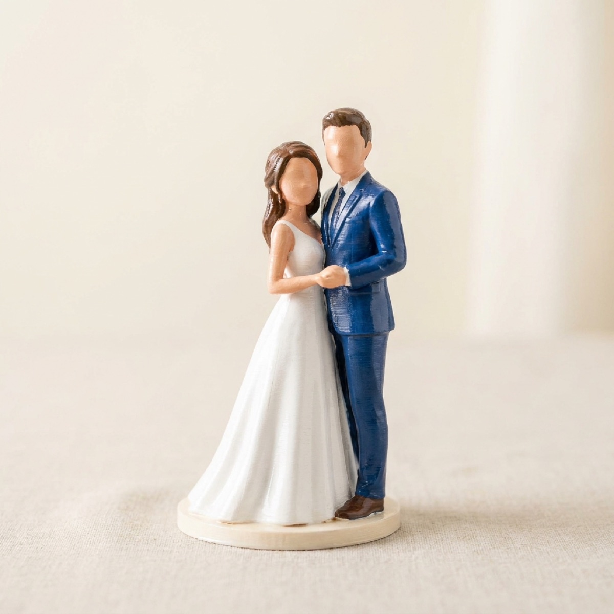 Hand-painted 3D-printed figurine cake topper of a couple