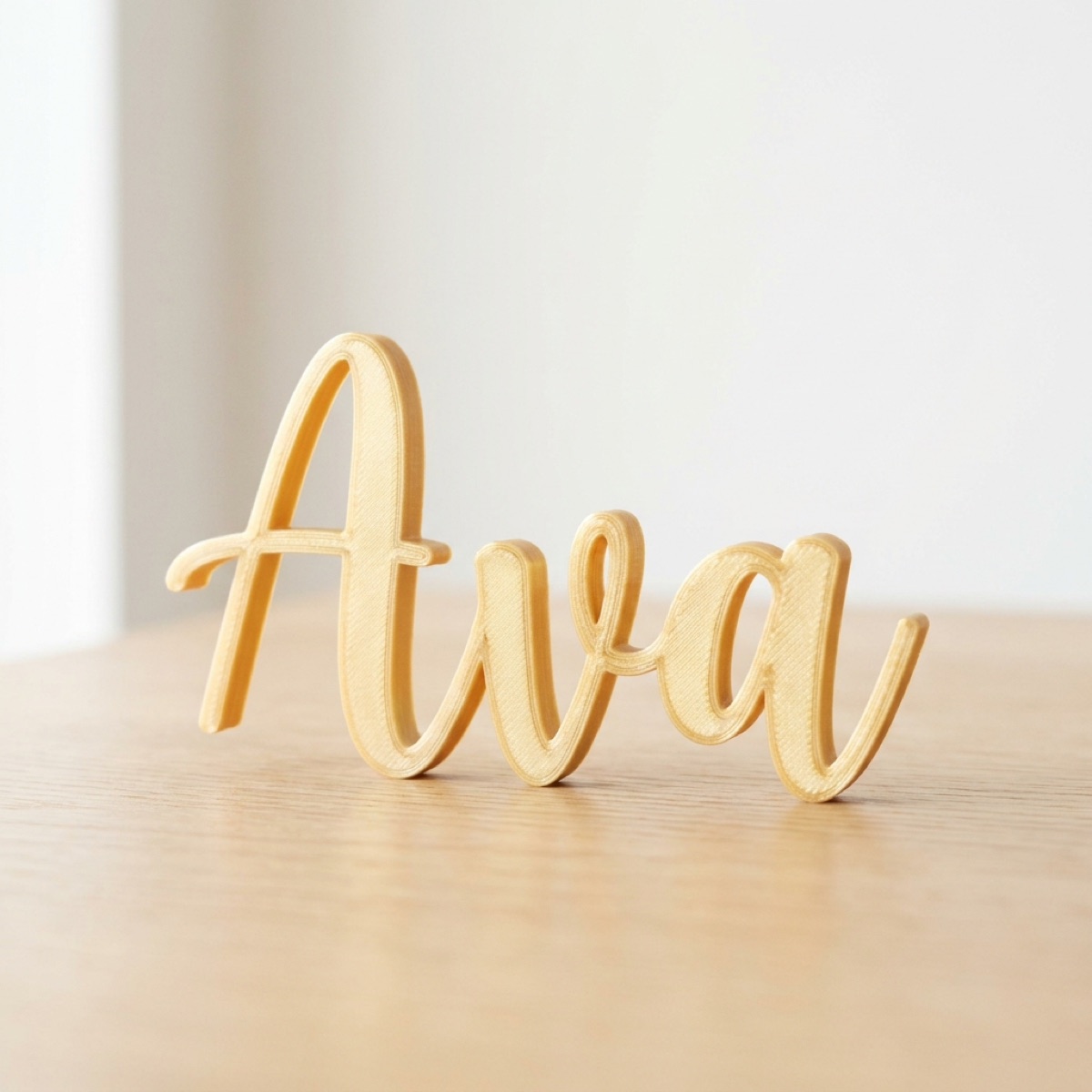 3D-printed silk-gold script place card