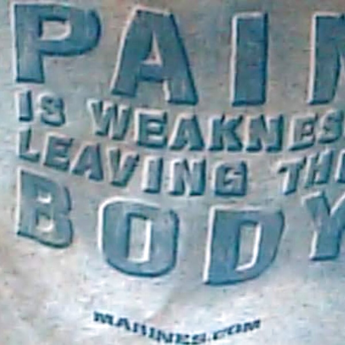 A shirt reading &lsquo;Pain is weakness leaving the body&rsquo;